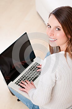 Young woman with laptop computer