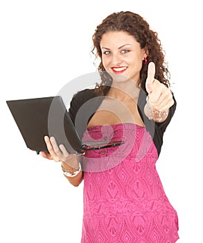 Young woman with laptop and thumb up