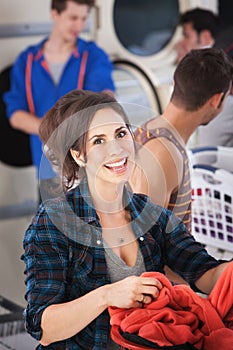 Young Woman in Laundromat
