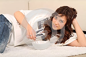 Young woman laying on the floor