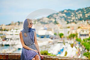 Young woman on Le Suquet hill in Cannes, France photo
