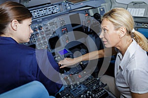 young woman learning to become pilot