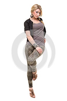 young woman in a leggings and jacket, isolated on white