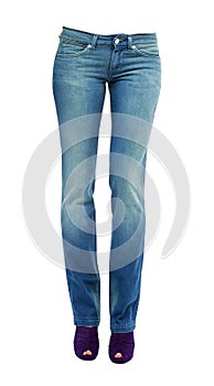 Young woman legs with clear blue jeans and purple peep toe pumps