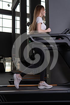 Young woman length indoors treadmill profile full exercise people, for workout fit for caucasian for training recreation