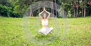 Young woman levitating in yoga position, meditation