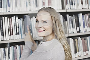 Young woman in library