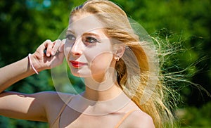 Young woman lifestyle portrait at nature