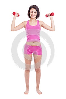 Young woman lifting dumbbells