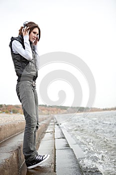 Young woman listen to music