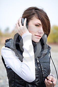 Young woman listen to music