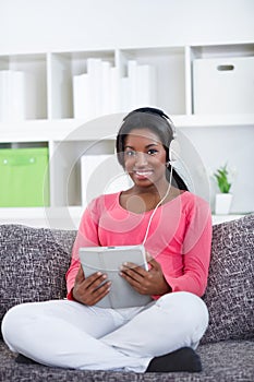 Young woman listen to music