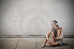 Young woman listening to the music