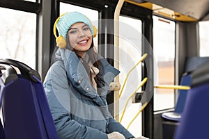 Young woman listening to music with headphones