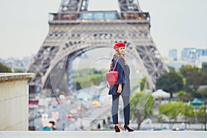 Young woman with long blond curly hair in Paris, France