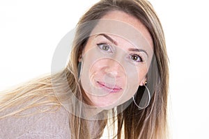 Young woman with Long blond Hair in white Background