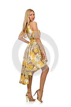 Young woman in long floral dress isolated on white