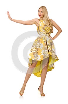 Young woman in long floral dress isolated on white