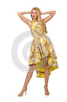 Young woman in long floral dress isolated on white