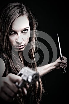 young woman long hair - gun knife