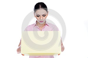 Young woman looking in amazement into a box