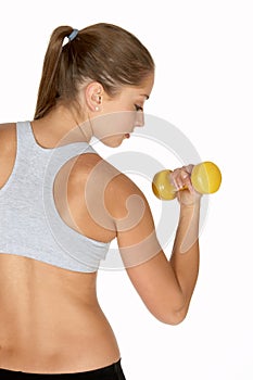 Young Woman Looking at Bicep Curl