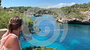 Young woman looking at blue sea