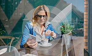 Young woman looking at cellphone