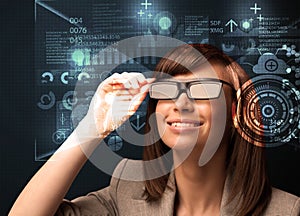 Young woman looking with futuristic smart high tech glasses