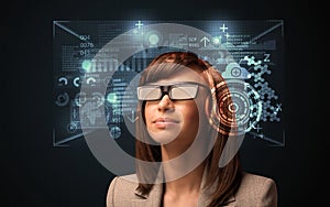 Young woman looking with futuristic smart high tech glasses