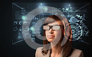 Young woman looking with futuristic smart high tech glasses