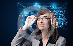 Young woman looking with futuristic smart high tech glasses