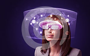 Young woman looking at futuristic social network map