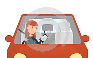 The Young Woman Looking at hers Mobil Phone while Driving.