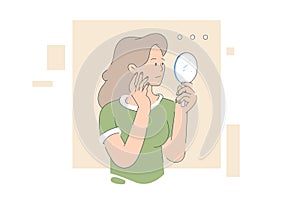 Young woman looking at mirror at home
