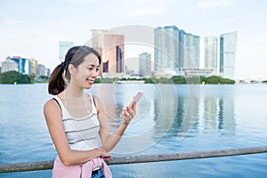 Young woman looking at mobile phone