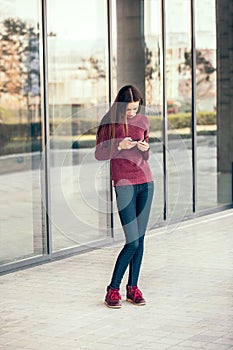 Young woman looking at a smartphone