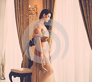 Young woman in luxury house interior