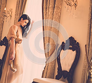 Young woman in luxury house interior
