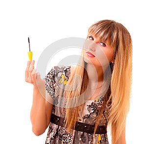 Young woman make up her eyelash isolated