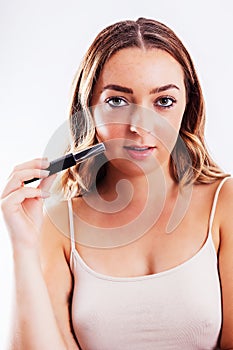 Young woman with make up pencil