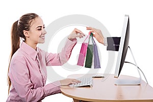 Young Woman makes Order on Computer and gets Delivery