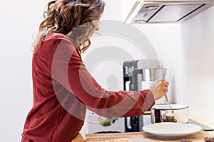 Young woman making cookies