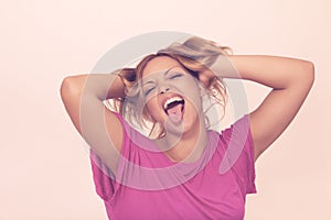 Young woman making funny faces