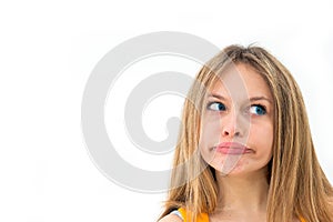 Young woman making a funny grimace photo