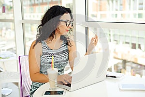 Young woman making online payment with credit card. Shopping onl