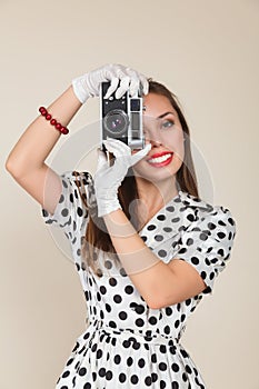 Young woman making photos