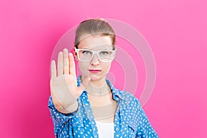 Young woman making a rejection pose