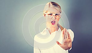 Young woman making a rejection pose