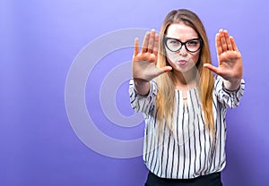 Young woman making a rejection pose